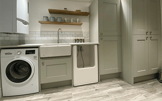 The Fabricon Group Incredible Dog Shower shown in a utility room