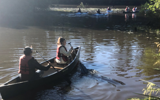 Xylem-Covington-Hosts-Family-River-Clean-Up-participants-in-canoes.jpg